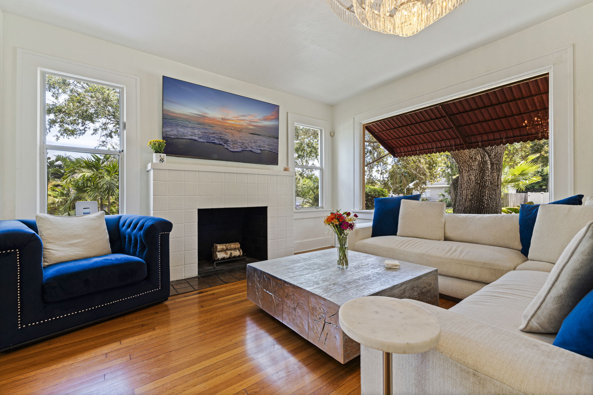 Living space with oak floors and abundant natural light